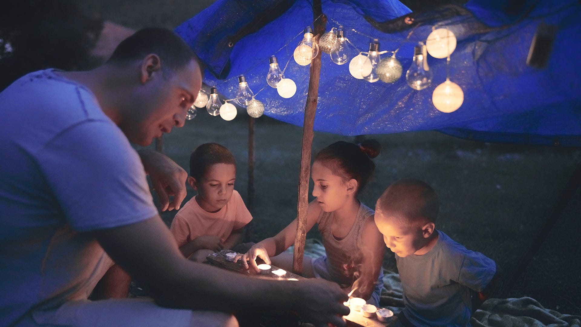 family camping outdoors