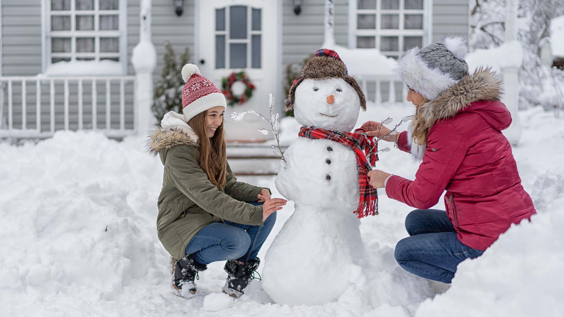 family in winter backyard